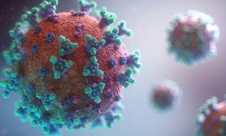 una molecola di virus di colore nero e blu chiaro insieme ad altre molecole più piccole